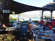 Louer un bateau pour se rendre au restaurant L'escale